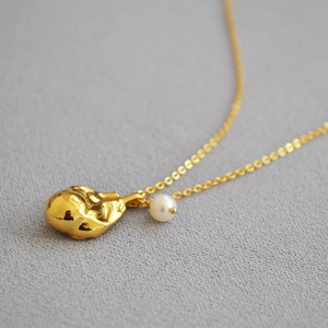 Baroque freshwater pearl pendant on a gold plated brass minimalist necklace for women