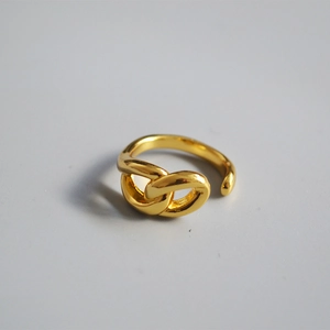 Detailed close-up of 18K gold plated chain link open ring with polished finish