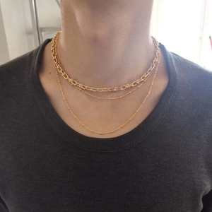 Three-layer 18K gold plated brass layered necklace featuring U-link and satellite chains