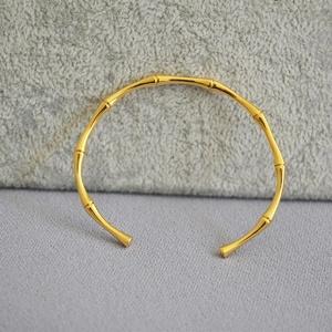 Minimalist gold-plated brass bamboo style open bangle for women with polished finish