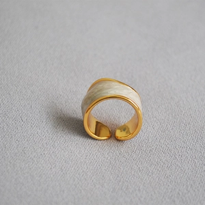 Minimalist wide chunky gold ring with creamy pearlescent enamel and irregular design