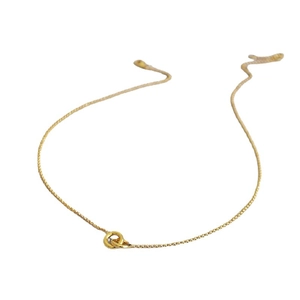 Elegant gold double interlocking circles pendant necklace on a minimalist chain