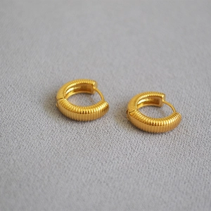 French design gold-plated brass hoop earrings with textured spiral thread pattern