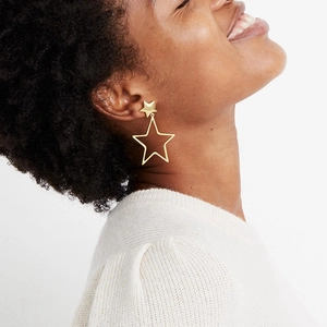 Retro hollow star gold earrings for women featuring a layered double pentagon design
