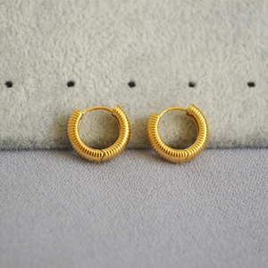 French minimalist gold-plated brass hoop earrings with elegant spiral thread texture
