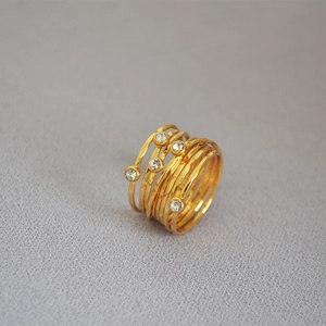 French vintage handmade gold bird nest ring with layered metal bands and crystals