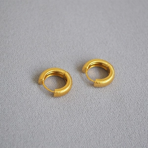 French minimalist gold-plated brass hoop earrings with elegant spiral texture