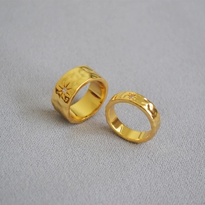 Textured gold brass North Star rings with handcrafted wave pattern and zircon stone