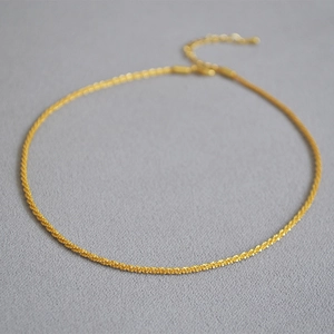 Detail of 18k gold plated brass rope chain necklace with adjustable lobster clasp