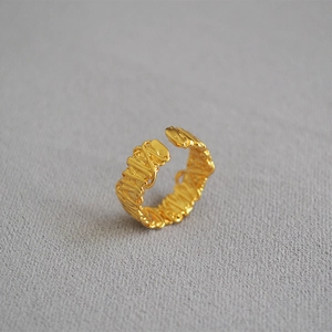 Minimalist gold woven open ring with a unique handcrafted braided texture for women