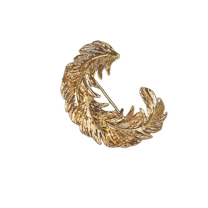 Exquisite gold feather brooch with textured metal finish for coats and sweaters