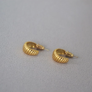 French style croissant gold plated earrings with a ribbed minimalist jewelry design