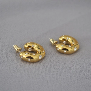 Chunky gold irregular C-shape hoop earrings with sparkling rhinestones for women