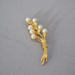 Vintage gold pearl lily of the valley brooch with branch texture for sweaters