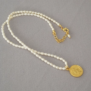 French vintage freshwater pearl necklace with gold coin pendant and adjustable lobster clasp