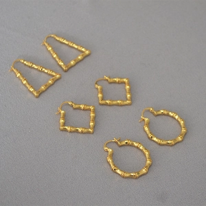Three-pair set of gold-plated geometric earrings featuring unique bamboo textures and clasps