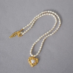 Vintage irregular heart pendant necklace with freshwater rice pearls and gold lobster clasp