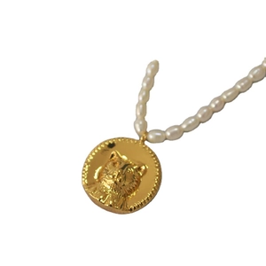 Retro baroque pearl necklace featuring a golden cat coin pendant with tiger relief