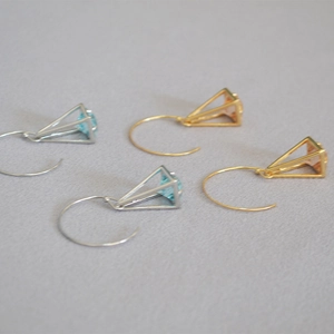 Minimalist pyramid birdcage drop earrings with faceted zircon in gold and silver plating
