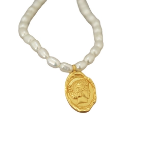 French vintage freshwater pearl necklace with a gold oval coin portrait relief pendant