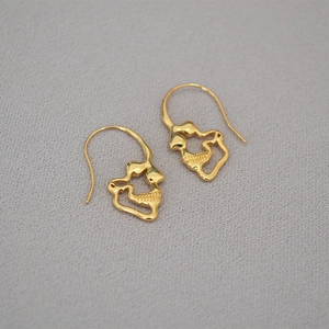 Golden punk style skeleton face drop earrings with unique artistic abstract design