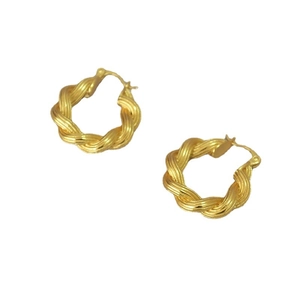 Modern twisted rope hoop earrings in golden finish with minimalist braided design for women