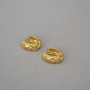 Minimalist gold-plated brass hoop earrings featuring a chic quilted lattice pattern