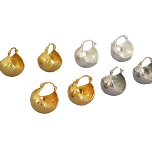 Polished and matte hollow gold and silver hoop earrings in minimalist geometric design