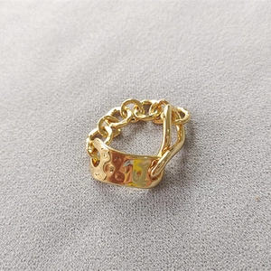 Golden irregular hammered texture chain ring with retro industrial minimalist style
