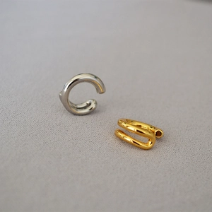 Minimalist double-layered gold and silver ear cuffs for non-pierced ears in polished finish