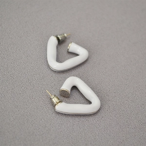 French style triangle enamel earrings with 18k gold plated finish on gray background