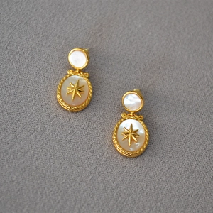 Golden north star earrings with freshwater mother-of-pearl and 925 silver needle studs