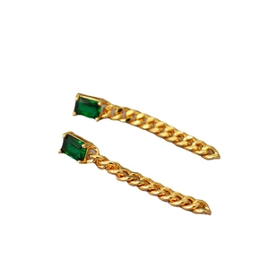 Vintage style gold earrings with rectangular emerald stones and long cuban chain drops