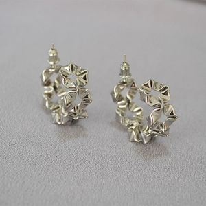 Modern hollow ruffle flower hoop earrings in 925 silver with a metallic pleated design