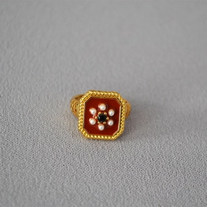 Vintage gold square ring with red enamel, black gem, and pearl flower detailing