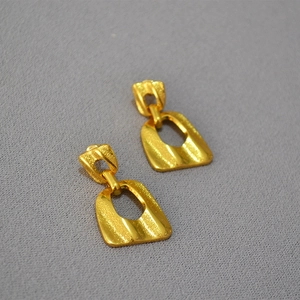 Vintage style irregular geometric brass earrings with matte and polished gold finish