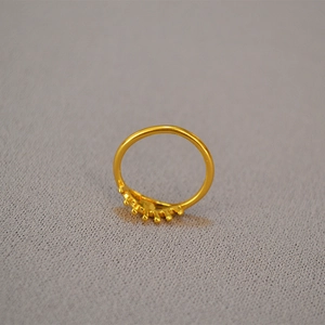 Minimalist gold plated brass ring featuring a unique hollow eye and crown spike design