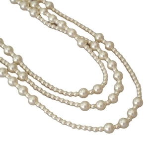 Three-layer faux pearl necklace featuring alternating large and small cream beads for women
