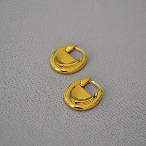 French style thick oval gold plated brass hoop earrings with a polished mirror finish