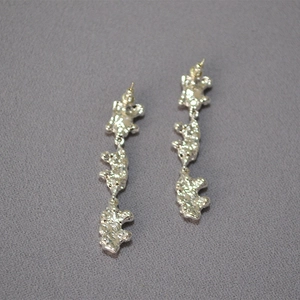 Silver liquid metal lava texture drop earrings with a three-section long design