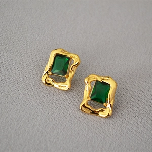 Vintage brass gold earrings featuring rectangular emerald zircon and wavy textured finish