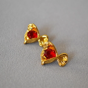 Creative gold candy-shaped stud earrings with red round cubic zirconia stones