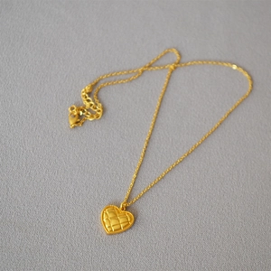 French vintage quilted heart pendant necklace in gold finish for a minimalist look