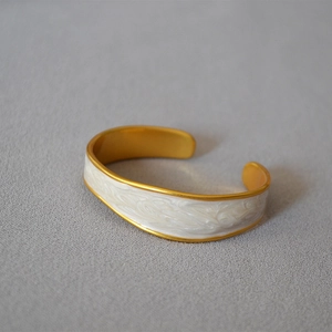 Irregular vintage gold-plated brass cuff bracelet with white pearl enamel finish