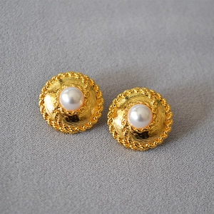 Vintage gold round disk earrings with faux pearls and intricate brushed radial texture