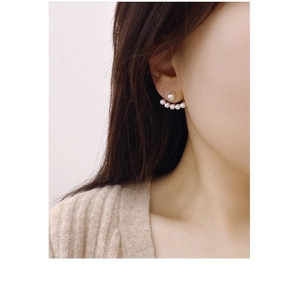 Elegant 925 silver needle pearl jacket earrings with fanned floating pearls on a model