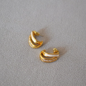 Golden C-shaped double layer hoop earrings with white enamel and zircon stones