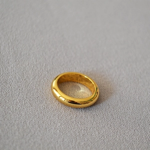 Minimalist French style polished gold-plated brass ring with a smooth finish for women