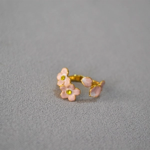 Pastel pink enamel cherry blossom open ring with yellow crystal in gold finish