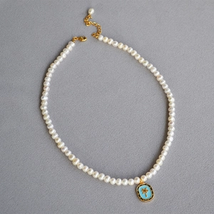 Vintage necklace with blue enamel palm tree pendant and freshwater pearls